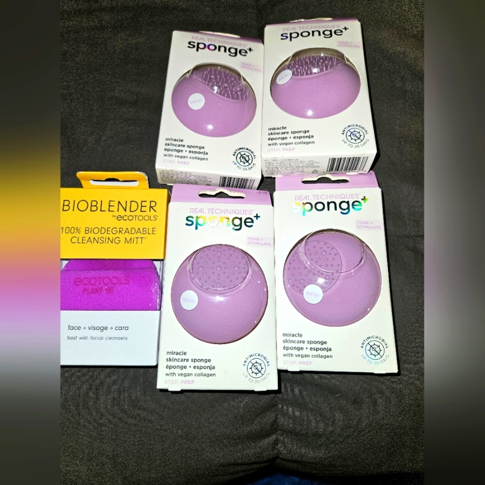 Real Techniques skin care sponge in purple plus an Eco Tools sponge.